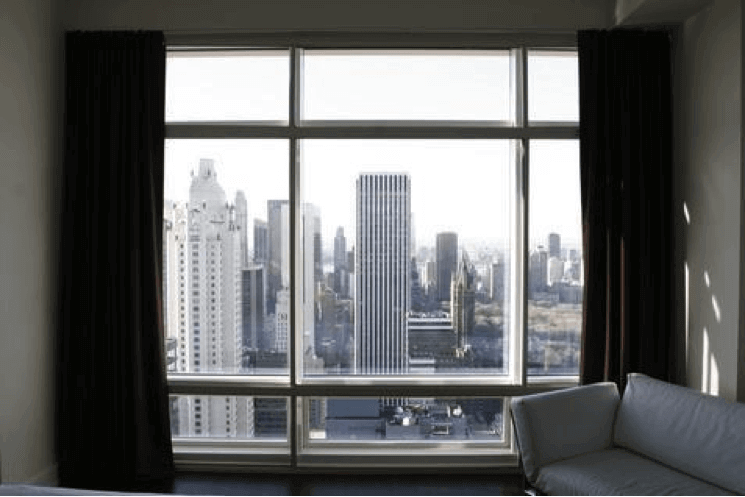 view of city through citiquiet windows