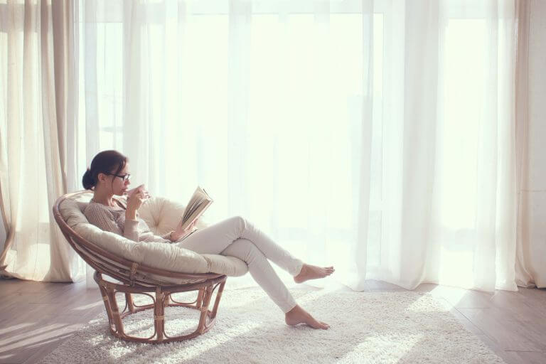 woman next to citiquiet windows