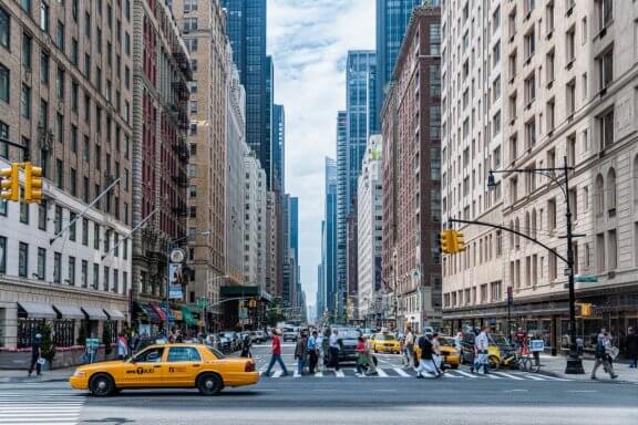 pedestrians crossing a NYC street